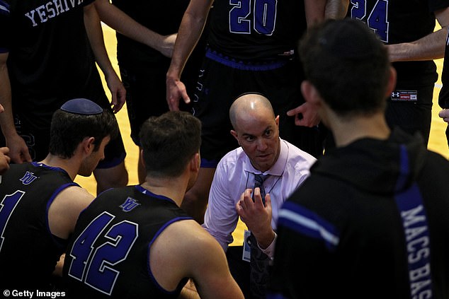Yeshiva basketball coach Elliot Steinmetz (in white) helped Jackson learn about his actions