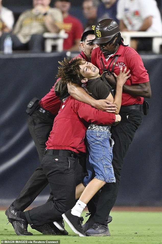 The good times came to an end with a guard grabbed the boy and another came in for a tackle