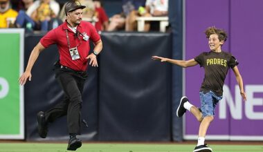 The child initially ran around in a circle before security quickly closed in on the young man