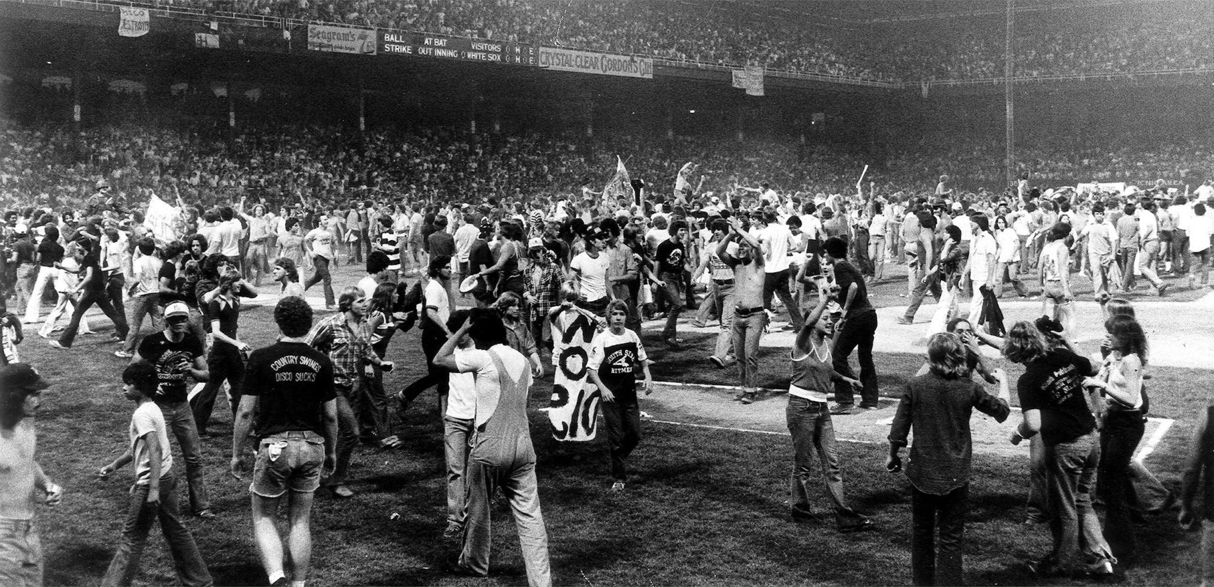 An anti-disco promotion in Comiskey Park in 1979 drew thousands of teens, who poured onto the field between games of a White Sox double-header. The Sox forfeited the second game.