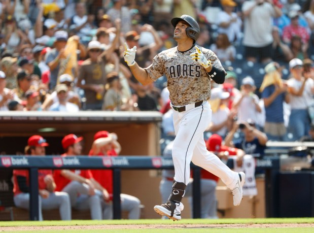 Ramón Laureano #5 of San Diego Padres round the bases after hitting a solo home run in the eighth inning against the St. Louis Cardinals at Petco Park on Aug. 3, 2025 in San Diego, California. (K.C. Alfred / The San Diego Union-Tribune)