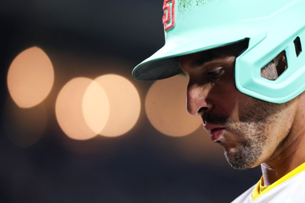 Ramon Laureano #5 of the San Diego Padres walks back to the dugout after flying out during the sixth inning against the St. Louis Cardinals at Petco Park on Friday, Aug. 1, 2025 in San Diego, CA. (Meg McLaughlin / The San Diego Union-Tribune)