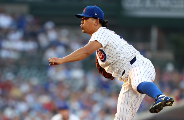 Chicago Cubs starting pitcher Shota Imanaga follows through on a pitch to the Cincinnati Reds in the first inning of a game at Wrigley Field in Chicago on Aug. 5, 2025. (Chris Sweda/Chicago Tribune)