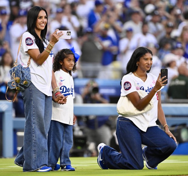 Vanessa Bryant,left with her children Capri, center, and Natalia Looks...