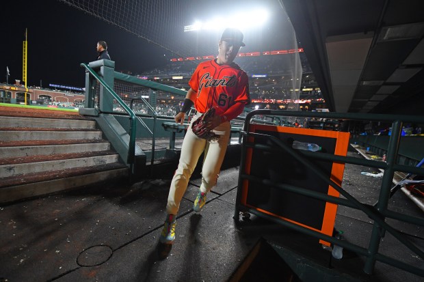 San Francisco Giants' Drew Gilbert (61) heads to the locker room after playing in his first MLB game at Oracle Park in San Francisco, Calif., on Friday, Aug. 8, 2025. The San Francisco Giants defeated the Washington Nationals 5-0. (Jose Carlos Fajardo/Bay Area News Group)