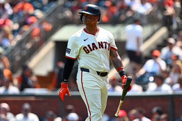 San Francisco Giants' Rafael Devers (16) returns to the dugout after striking out in the sixth inning of their MLB game at Oracle Park in San Francisco, Calif., on Sunday, Aug. 10, 2025. The Washington Nationals defeated the San Francisco Giants 8-0. (Jose Carlos Fajardo/Bay Area News Group)