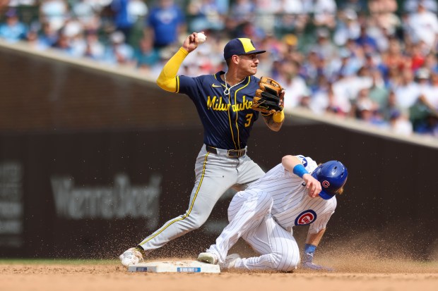 Milwaukee Brewers shortstop Joey Ortiz (3) gets Chicago Cubs outfielder Owen Caissie (19) out at second base with a force out during the seventh inning at Wrigley Field on Monday, Aug. 18, 2025. (Eileen T. Meslar/Chicago Tribune)