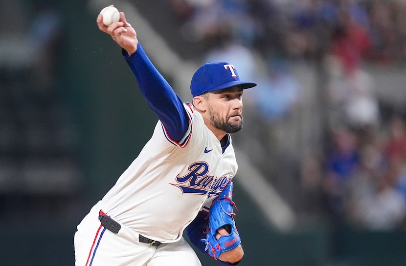 Texas Rangers pitcher Nathan Eovaldi delivers during the first inning of a baseball game...