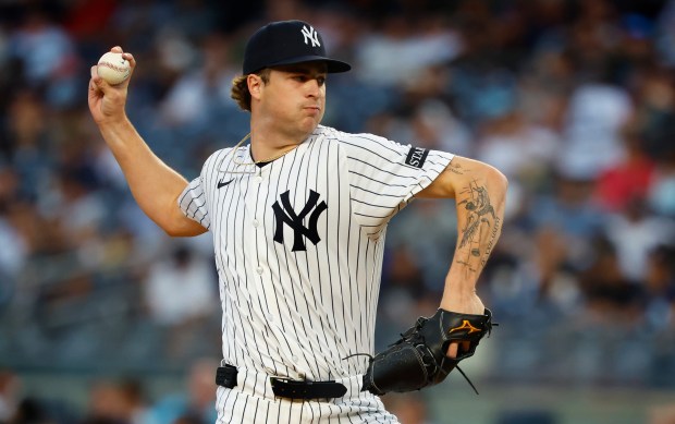 New York Yankees' Cam Schlittler throws against the Washington Nationals during the first inning of a baseball game, Monday, Aug. 25, 2025, in New York. (AP Photo/Noah K. Murray)