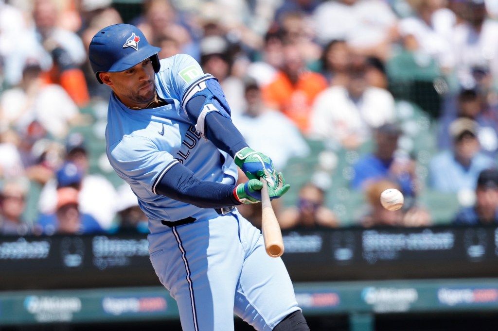 Toronto Blue Jays outfielder George Springer (4) hits a single in the third inning against the Detroit Tigers at Comerica Park.