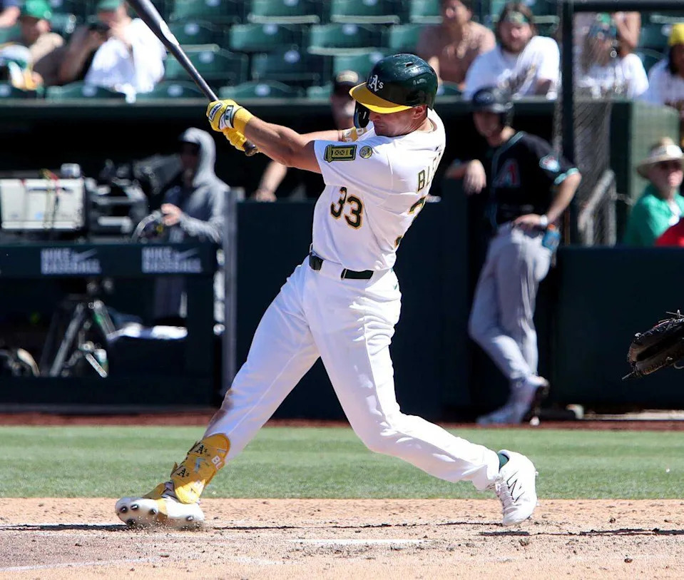 Athletics left fielder JJ Bleday (33) hits a solo home run against the Arizona Diamondbacks during the ninth inning Sunday at Sutter Health Park.