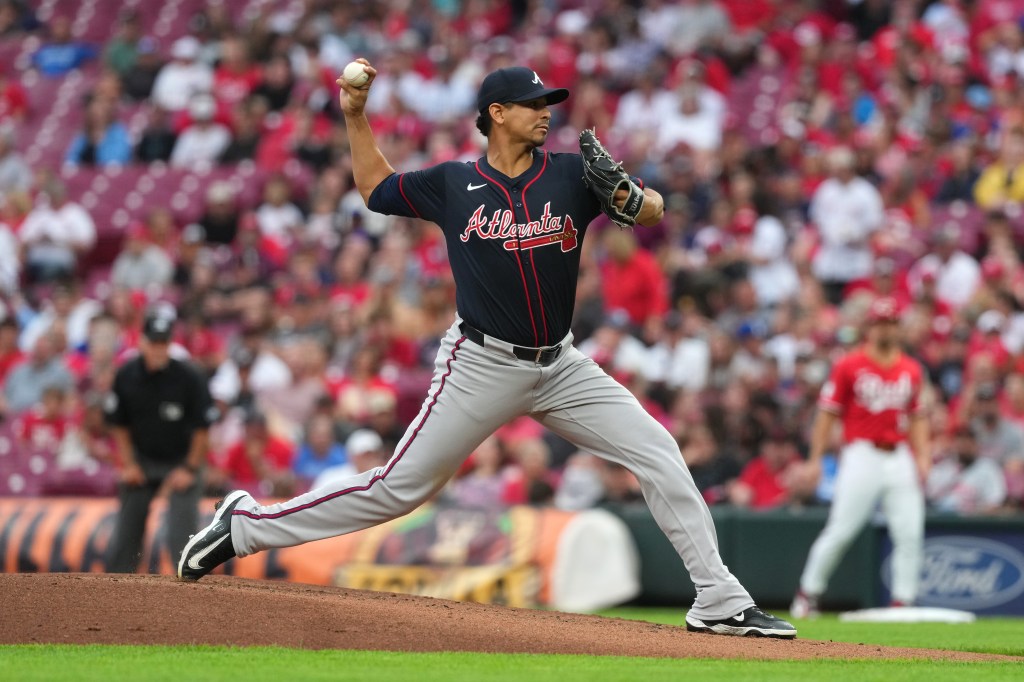 Atlanta Braves pitcher throwing a baseball.