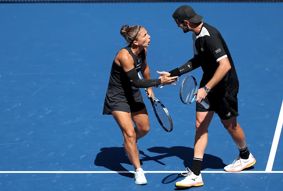 Errani and Vavassori celebrate during their first-round win on Tuesday. (Elsa/Getty Images)