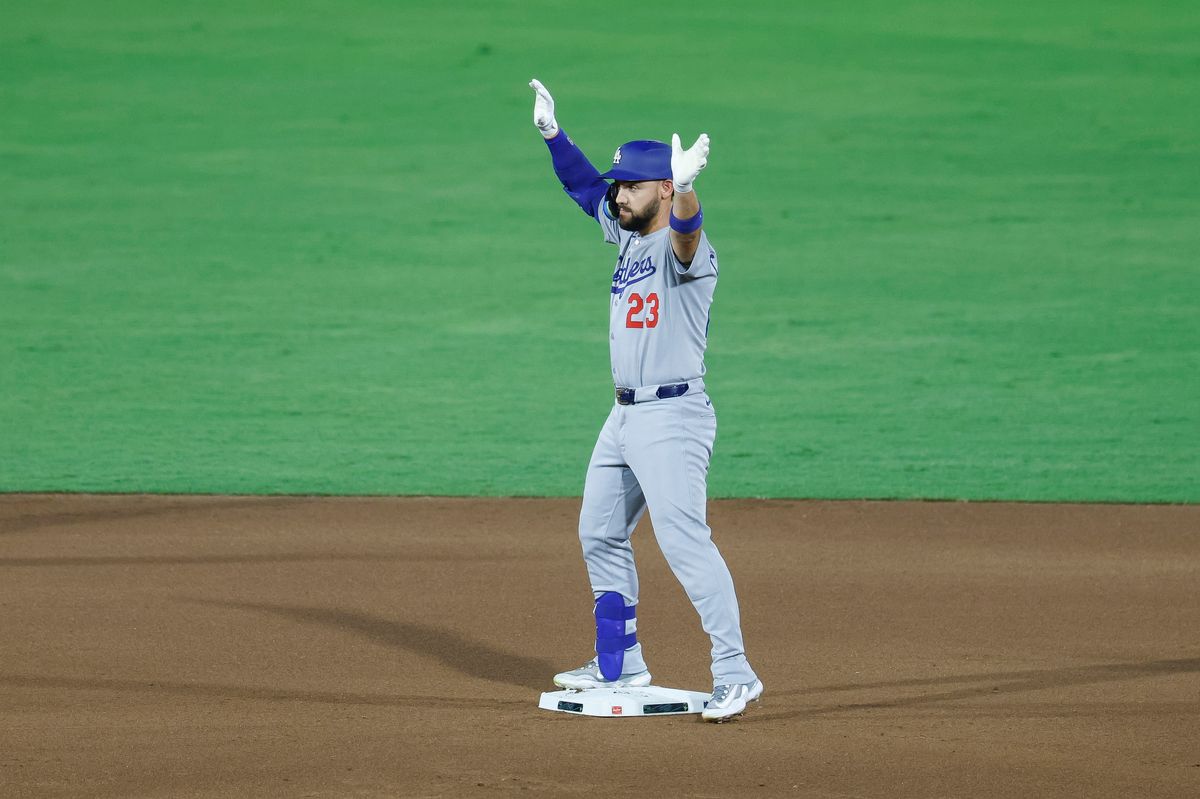 Michael Conforto #23 of the Los Angeles Dodgers celebrates against the Tampa Bay Rays at George M. Steinbrenner Field on August 01, 2025 in Tampa, Florida.
