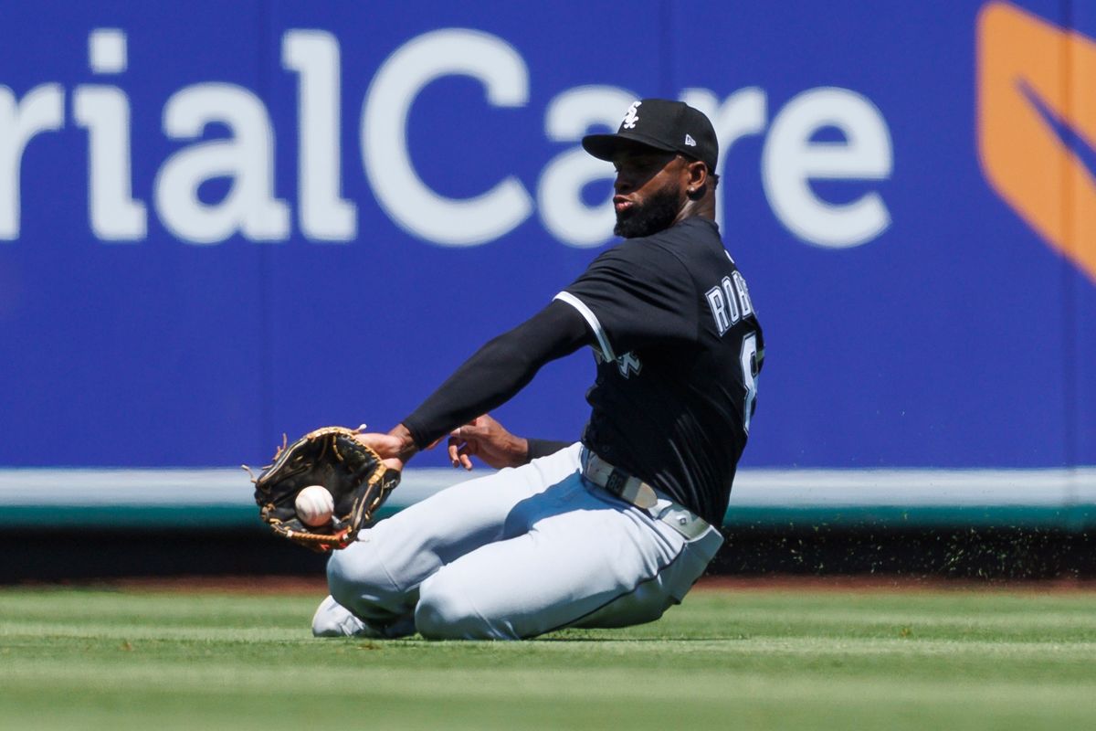 Luis Robert Jr. #88 of the Chicago White Sox catches the ball during the game against the Chicago White Sox at Angel Stadium of Anaheim on August 3, 2025 in Anaheim, California.