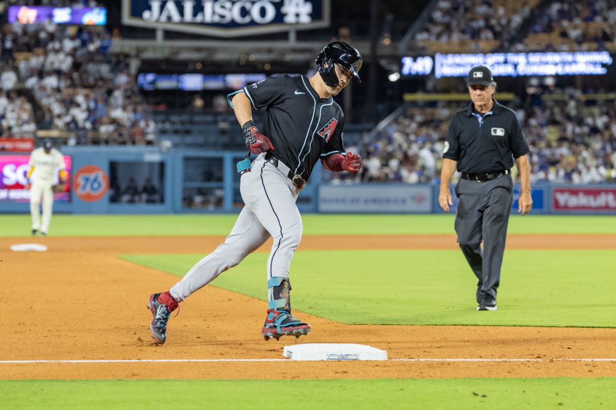 Corbin Carroll #7 of the Arizona Diamondbacks rounds third base after hitting a home run during an MLB game against the Los Angeles Dodgers at Dodger Stadium on August 30, 2025 in Los Angeles, California. Corbin Carroll #7 of the Arizona Diamondbacks rounds third base after hitting a home run during an MLB game against the Los Angeles Dodgers at Dodger Stadium on August 30, 2025 in Los Angeles, California.
