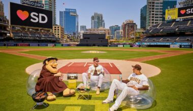 San Diego Padres baseball players Manny Machado and Jackson Merrill having a BBQ with the Friar at Petco Park for San Diego Magazine's 2025 Best of Issue cover