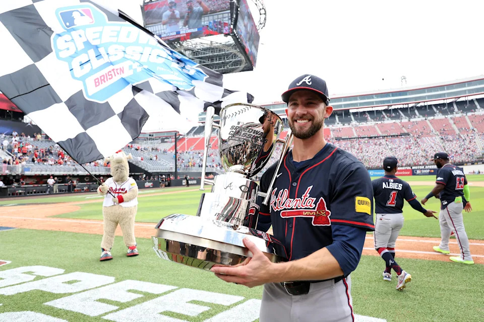 BRISTOL, TENNESSEE - AUGUST 03:  Eli White #36 of the Atlanta Braves holds the trophy after the Braves defeated the Cincinnati Reds 4-2 to win the MLB Speedway Classic between the Atlanta Braves and the Cincinnati Reds at Bristol Motor Speedway on August 03, 2025 in Bristol, Tennessee. (Photo by Jamie Squire/Getty Images)