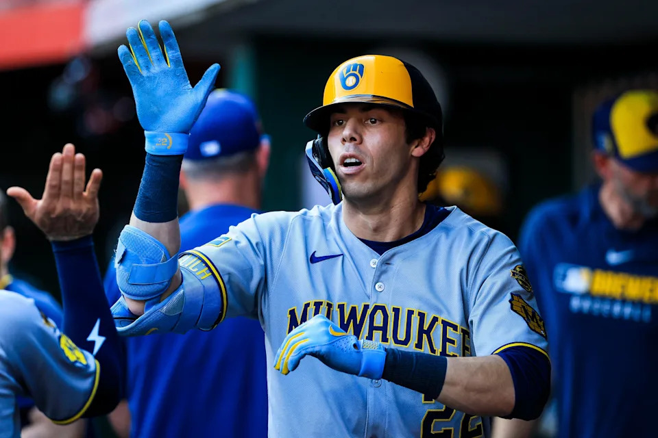 Christian Yelich homered twice, double, singled and drove in five runs as the Brewers came back to beat the Reds Friday.