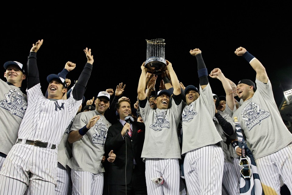 New York Yankees players celebrating their 2009 World Series win.