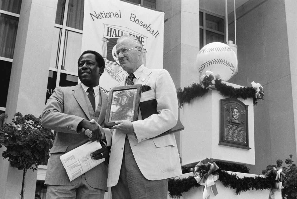Hank Aaron Receiving Hall of Fame Plaque