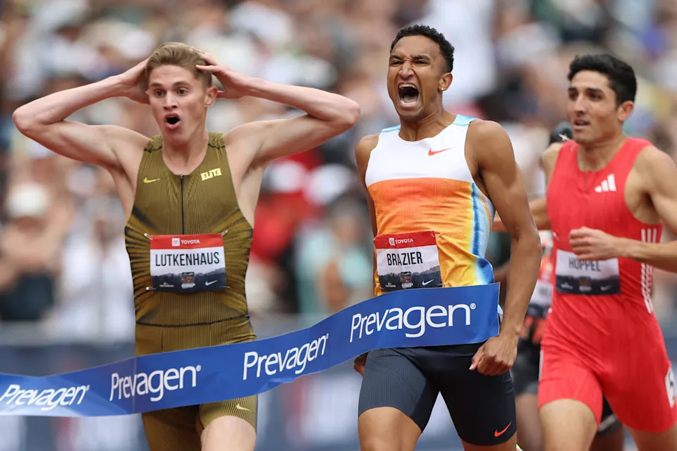 Lutkenhaus (L) had the same reaction as everyone watching at home. Incredible. (Emilee Chinn/Getty Images)