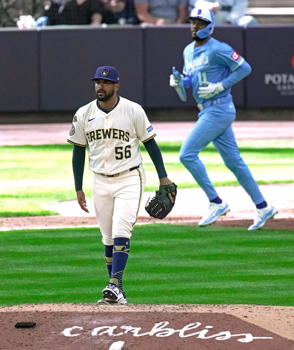 Milwaukee Brewers pitcher Grant Anderson walks back to the mound after walking in a run during the seventh inning of their game against the Kansas City Royals Monday, March 31, 2025 at American Family Field in Milwaukee, Wisconsin.