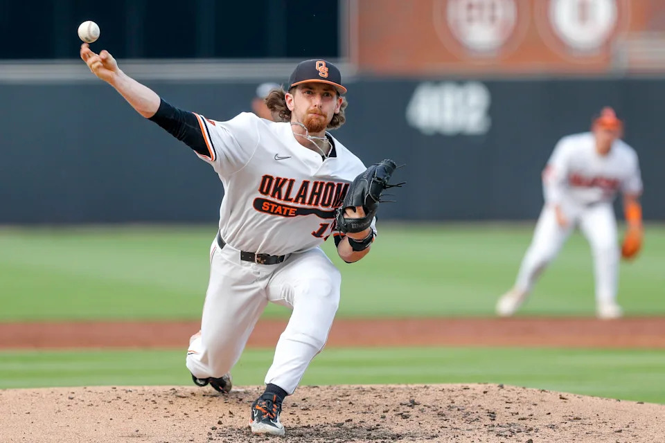 Oklahoma State utility Nolan McLean (13) pitches in the second inning during a game in the NCAA Stillwater Regional between the Oklahoma State Cowboys (OSU) and the Oral Roberts Golden Eagles at O'Brate Stadium in Stillwater, Okla., on Friday, June 2, 2023.