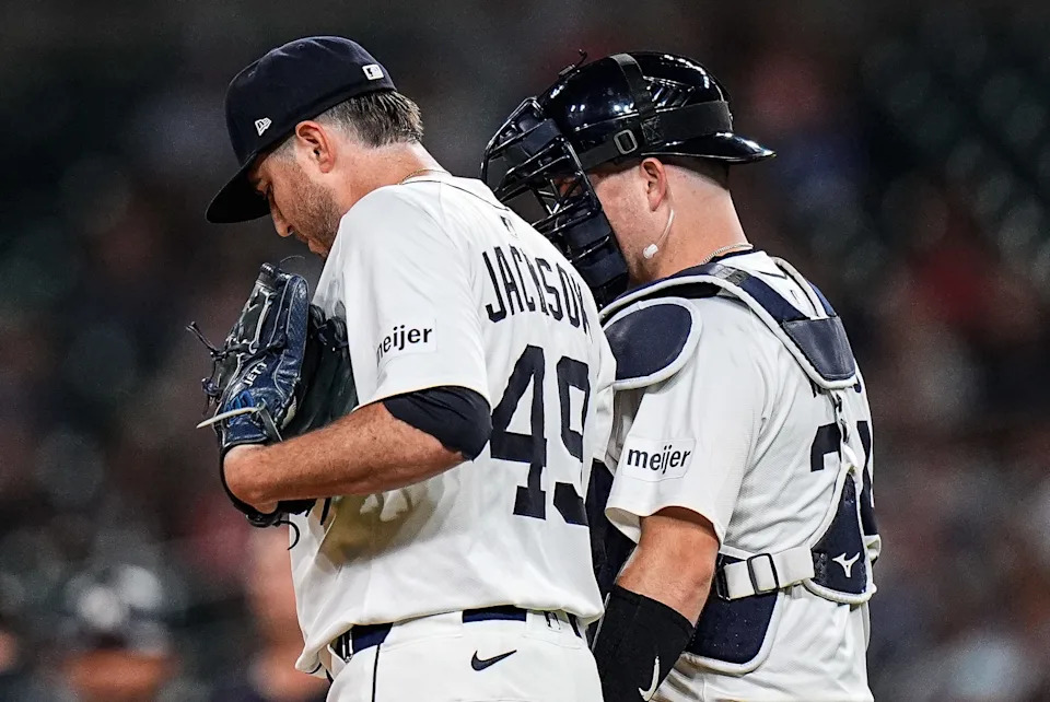 Detroit Tigers pitcher Luke Jackson (49) talks to catcher Jake Rogers (34) before a play against Minnesota Twins during the ninth inning at Comerica Park in Detroit in Tuesday, August 5, 2025.