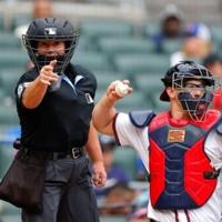 Pioneering MLB umpire Pawol debuts behind plate in Braves win | News