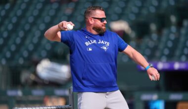 Before the game starts, John Schneider gets Jays’ batters ready