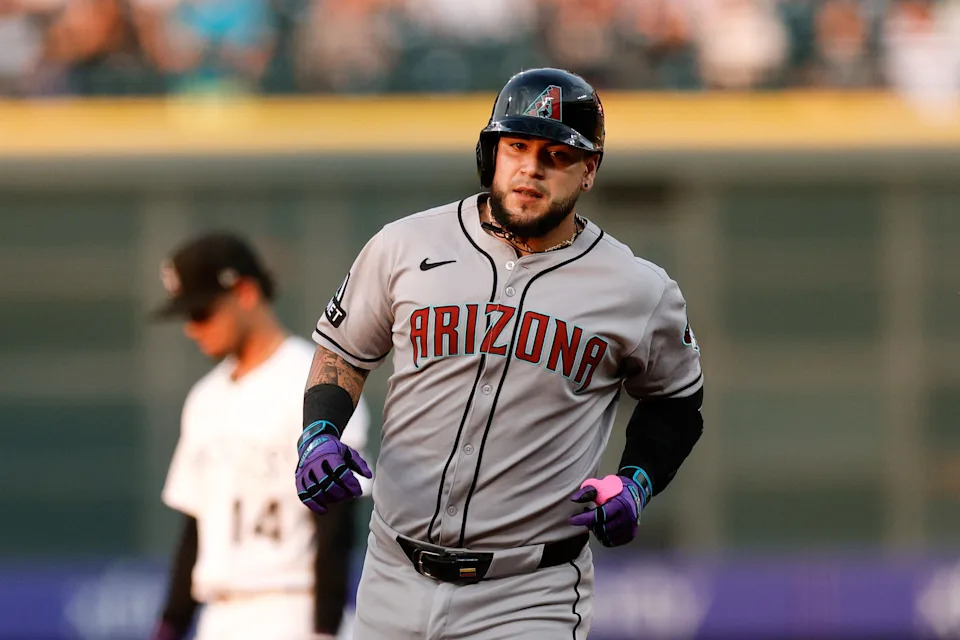 Arizona Diamondbacks catcher Jose Herrera (11) rounds the bases on a two run home run in the second inning against the Colorado Rockies at Coors Field in Denver, on Aug. 14, 2025.