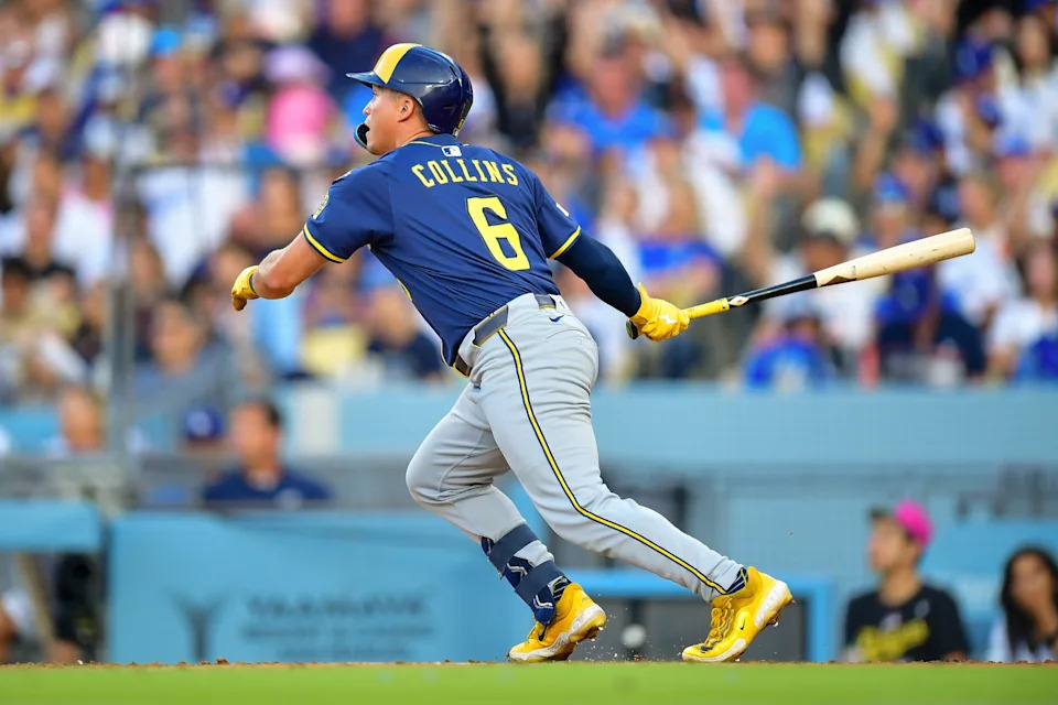 Jul 19, 2025; Los Angeles, California, USA; Milwaukee Brewers left fielder Isaac Collins (6) hits a solo home run against the Los Angeles Dodgers during the fourth inning at Dodger Stadium. Mandatory Credit: Gary A. Vasquez-Imagn Images