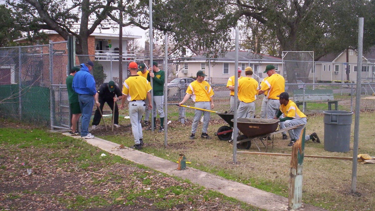 Hurricane Katrina flooded their field. The players helped rebuild.
