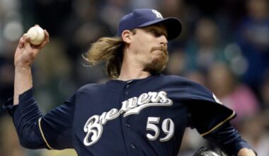 Even on his special day, John Axford tips his cap to Bob Uecker