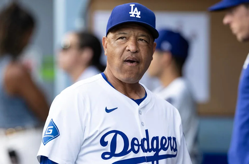 Dodgers manager Dave Roberts watches from the dugout during a 3-2 loss to the Cardinals on Monday.