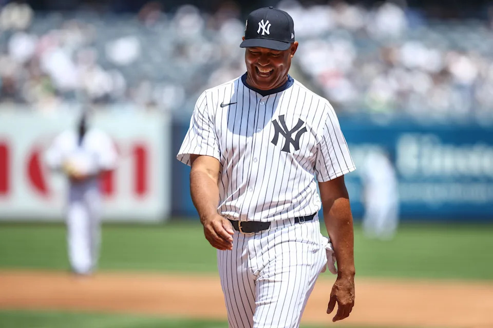 Aug 9, 2025; Bronx, New York, USA; Former New York Yankees pitcher Mariano Rivera reacts after reaching base during the Old Timer’s Day game at Yankee Stadium. Mandatory Credit: Wendell Cruz-Imagn Images