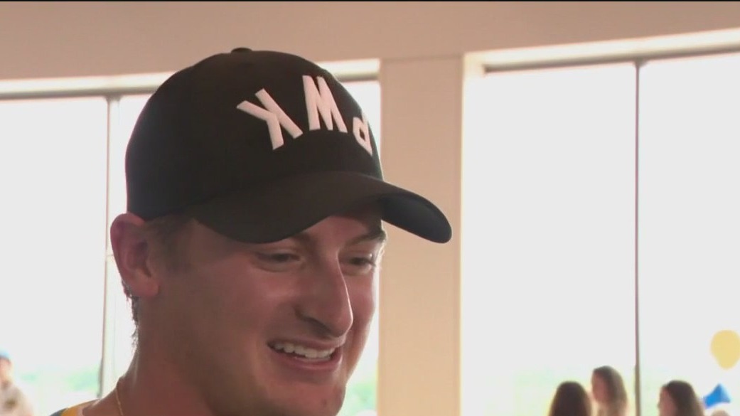 Brewers pitcher Quinn Priester visits with kids