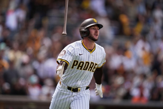 San Diego Padres' Jackson Merrill watches his two-run home run during the fourth inning of a baseball game against the Cleveland Guardians 307Wednesday, April 2, 2025, in San Diego. (AP Photo/Gregory Bull)