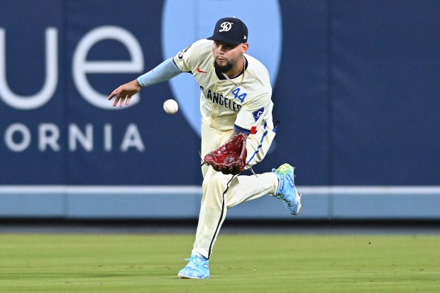 Dodgers center fielder Andy Pages catches a ball hit by...