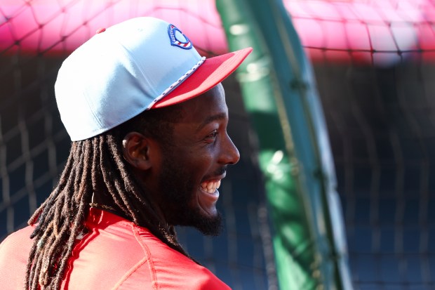 Cincinnati Reds star Elly De La Cruz reacts during batting...