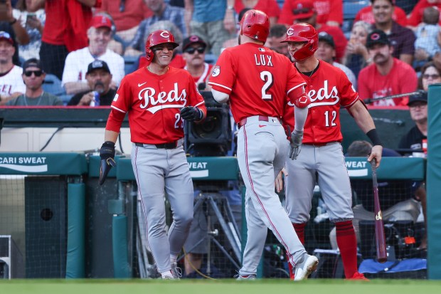 Cincinnati Reds designated hitter Gavin Lux (2) celebrates with TJ...