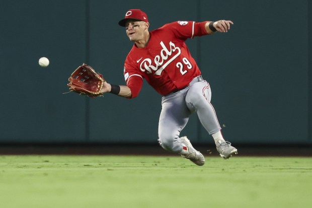 Cincinnati Reds center fielder TJ Friedl (29) makes a catch...