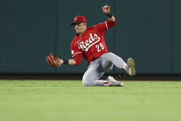 Cincinnati Reds center fielder TJ Friedl makes a catch during...