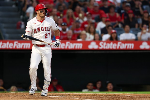 Los Angeles Angels’ Mike Trout reacts after striking out during...