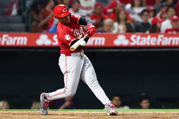 Cincinnati Reds’ Ke’Bryan Hayes hits a triple during the eighth...
