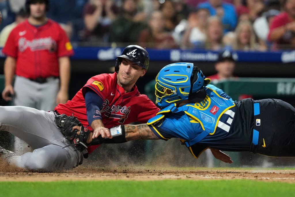 Bohm's eighth-inning sacrifice fly scores Schwarber and lifts Phillies over Braves