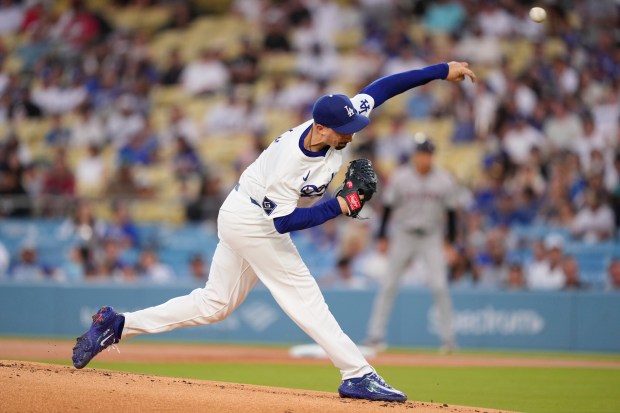 Dodgers starting pitcher Blake Snell throws to the plate during...