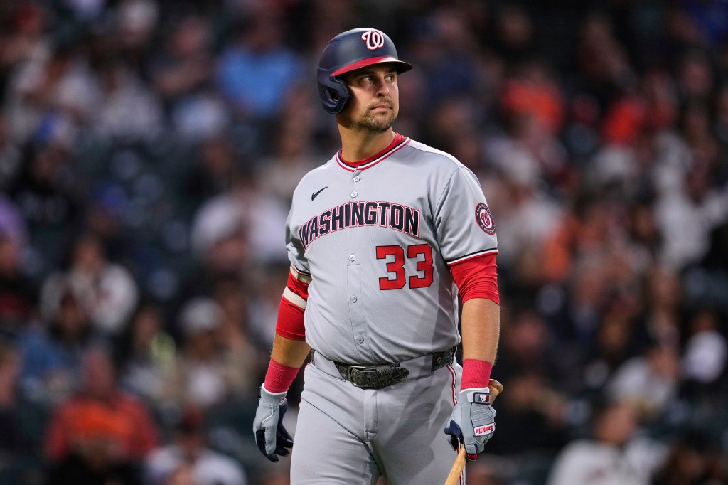Washington Nationals' Nathaniel Lowe walks to the dugout after striking out during the fourth inning of a baseball game against the San Francisco Giants, Friday, Aug. 8, 2025, in San Francisco.