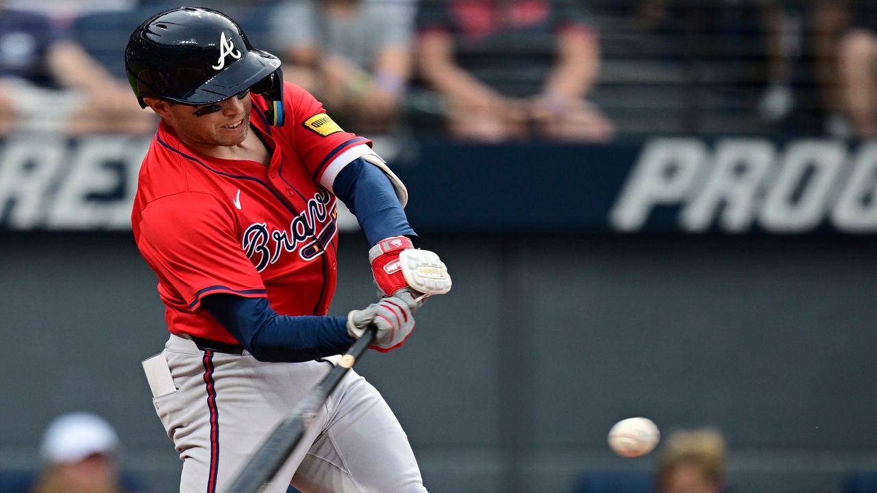 Cleveland Guardians' Jose Ramirez, right, is congratulated by Kyle Manzardo (9) after his home run in the first inning of a baseball game against the Baltimore Orioles in Cleveland, Tuesday, July 22, 2025. (AP Photo/Sue Ogrocki)